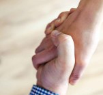 person wears multicolored blazer