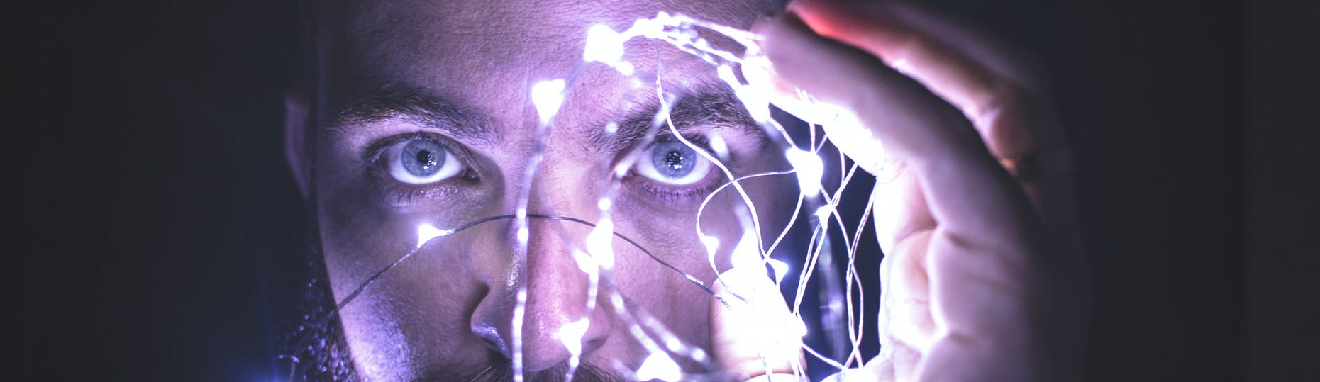 person holding string lights photo